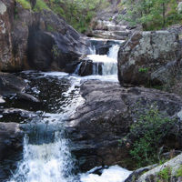 Waterfall cascading down rocks in Sturt Gorge Recreation Park